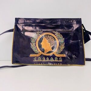 Retro Purple Leather Caesars Atlantic City Crossbody, slight wear on corners.